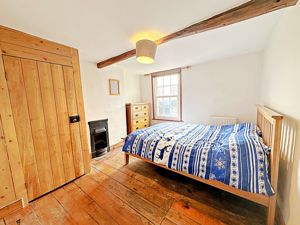 Bedroom One- click for photo gallery